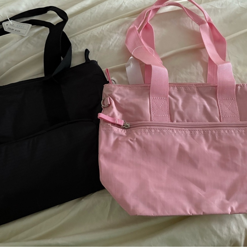 NWT- Set of 2
Pink & Black
Insulated Tote Bag
Perfect For traveling & Hiking - Picture 7 of 9